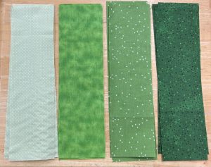 green fabric for holiday friends quilt